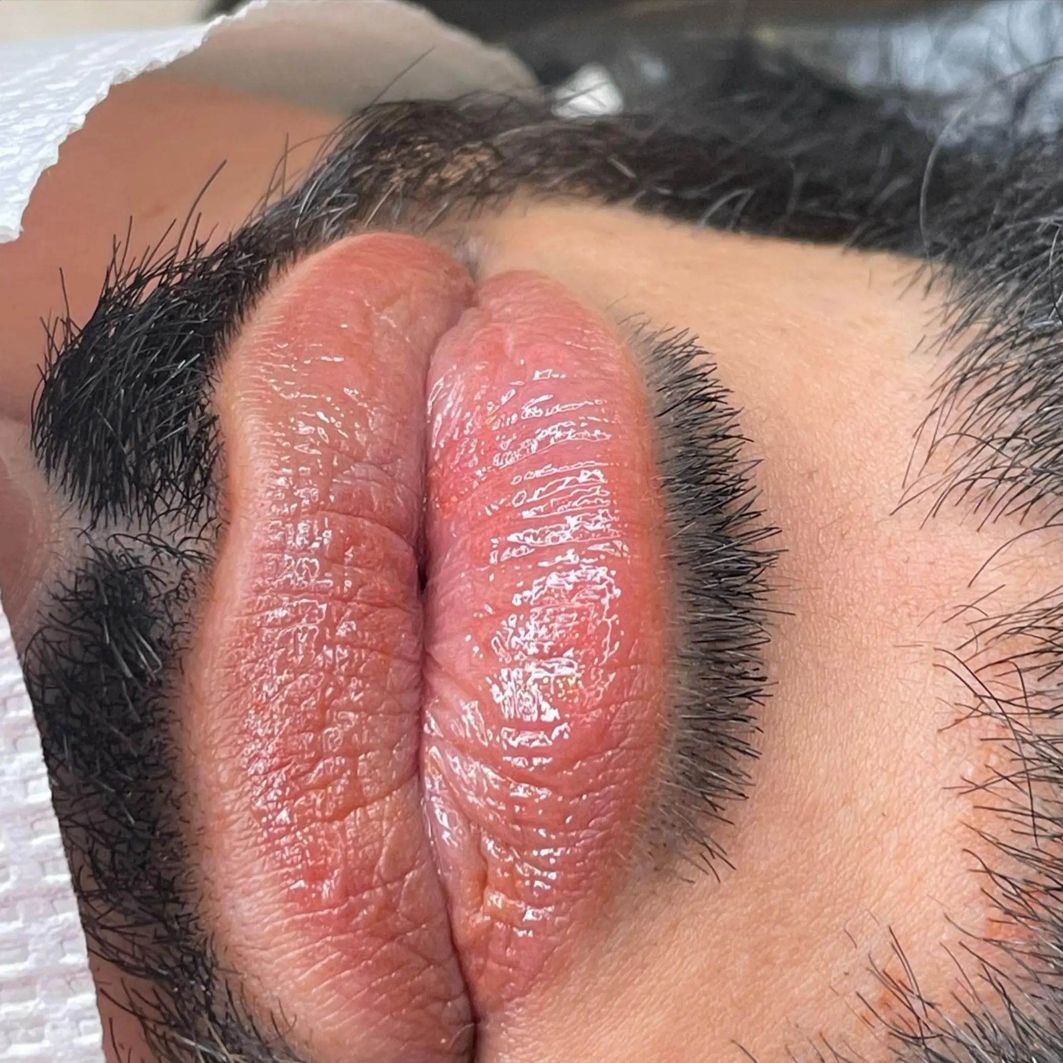 before and after men lip tattoo