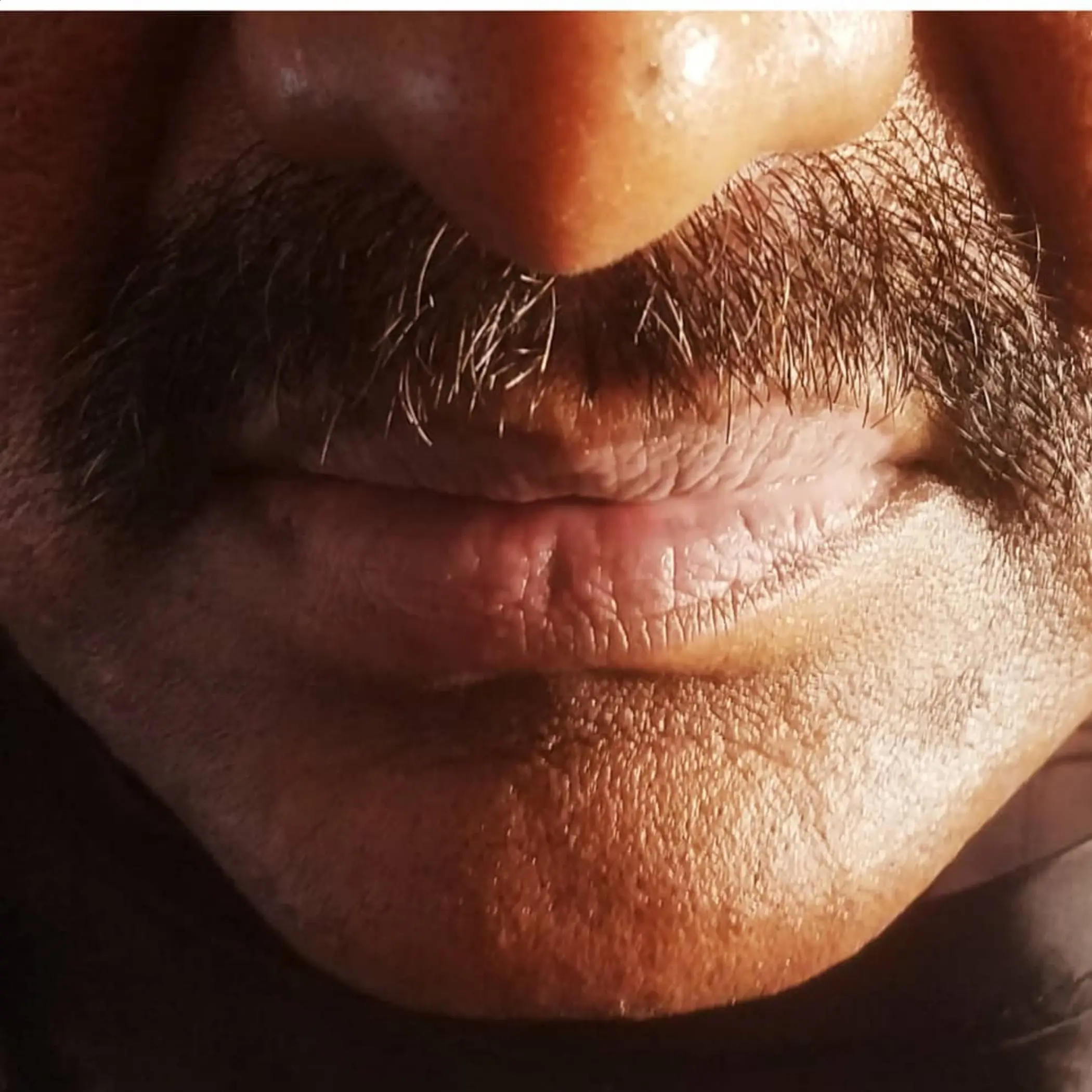 healing stages of lip tattoo male