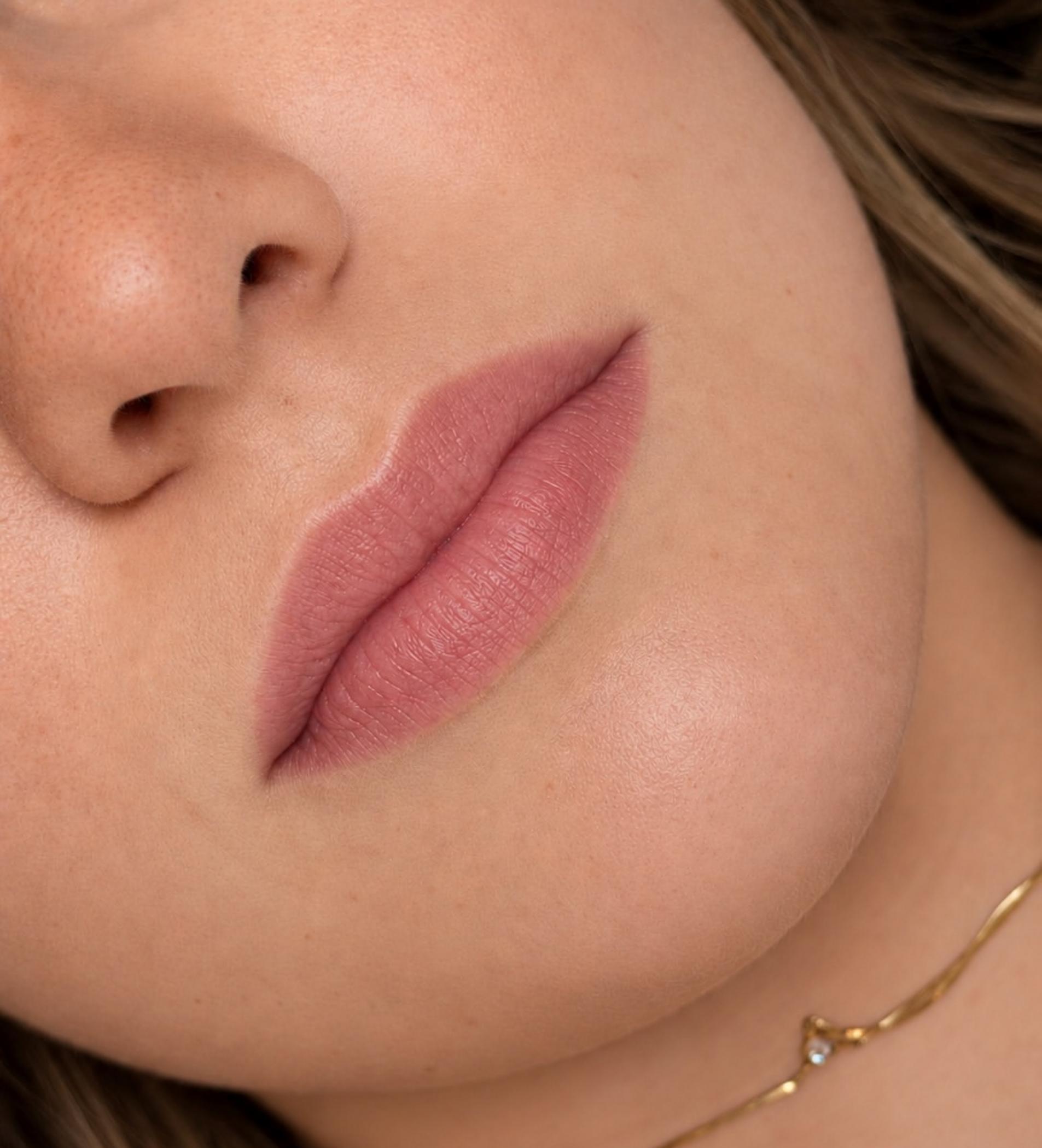 natural subtle lip tattoo result men